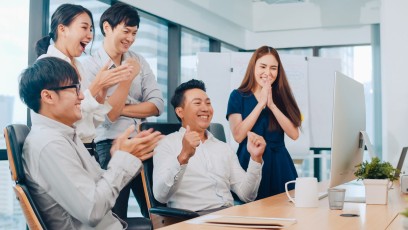 millennial-group-young-businesspeople-asia-businessman-businesswoman-celebrate-giving-five-after-dealing-feeling-happy-signing-contract-agreement-meeting-room-small-modern-office-scaled
